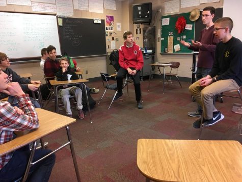 Alexander Pavlicin, senior and co-president speaks to club members about upcoming Earth Day events. Earth Day is April 22nd and YFSS is trying to plan a day similar to what the Amnesty club does for Human Rights Day. We want to bring in guest speakers to educate students on their power to create a greener world and the current local and global environmental issues, senior Maggie OReilly says.