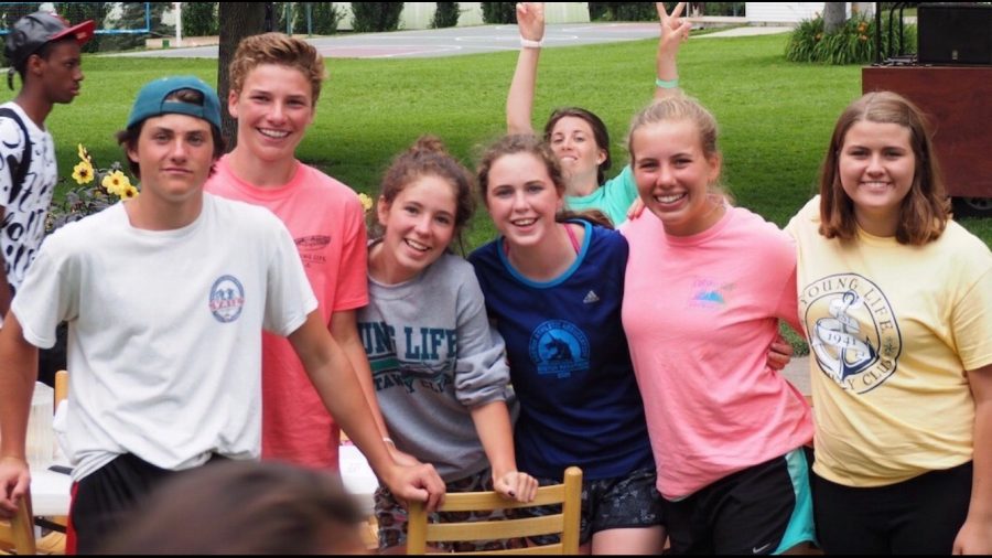 Photo courtesy Holly Ringsak. Young Life teens smile for the camera at Castaway camp. Its the people and the environment that has impacted me the most. It has strengthened friendships, introduced new ones to me, and given me strong role models, junior Holly Ringsak says.