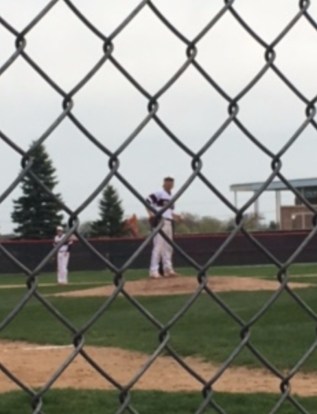 Graham Laubscher getting ready to pitch on April 7 against the Woodbury Royals. Mike Parker says, “Individually I am always rooting for him [Evan] to do well and hoping that he makes the plays and is enjoying himself.”