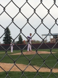 Graham Laubscher getting ready to pitch on April 7 against the Woodbury Royals. Mike Parker says, “Individually I am always rooting for him [Evan] to do well and hoping that he makes the plays and is enjoying himself.”
