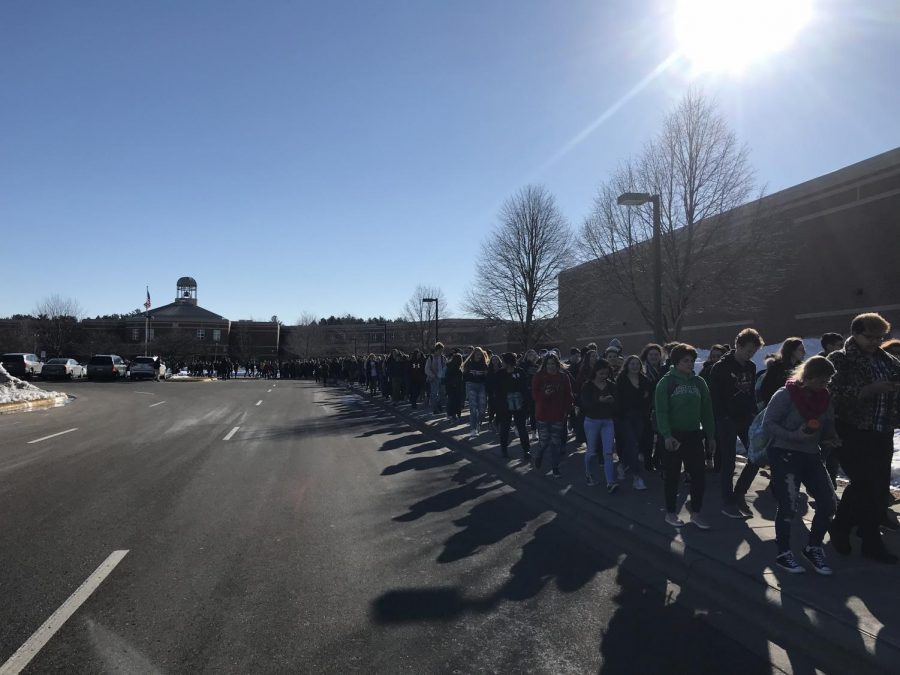 The organizers estimate that hundreds of students participated in this walk out. Students exited the building at 10 and made their way to the PAC where the remembrance was being held. “We may not be able to vote now, but we will be able to vote in one, two years, and our votes will matter, and our votes will change who is in Congress and they will hopefully make an impact on what they decide to do for legislation,” senior and organizer Hannah Gilsdorf says.

Hunter Hippel