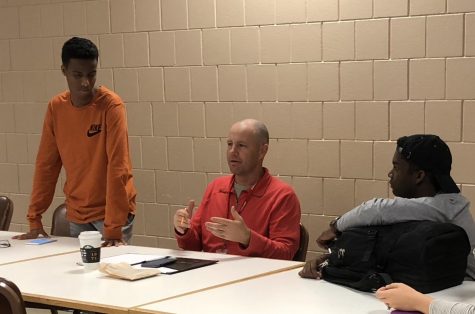 (From Left) Abdulaziz Mohamed, Dusty Dennis, and Nikhil Kumaran as they planned for upcoming events the Student Council had taken on.  Student Council meets before the school day begins on Tuesday mornings. We meet with our committee and then at group meetings once a week, Riniker said.