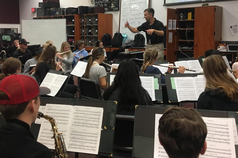 Band teacher Joel Bryan conducts rehearsal for the Kaleidoscope concert. 