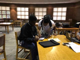 Donyea Davis & Chinmay Sahu working together on their projects for Genesys Works.