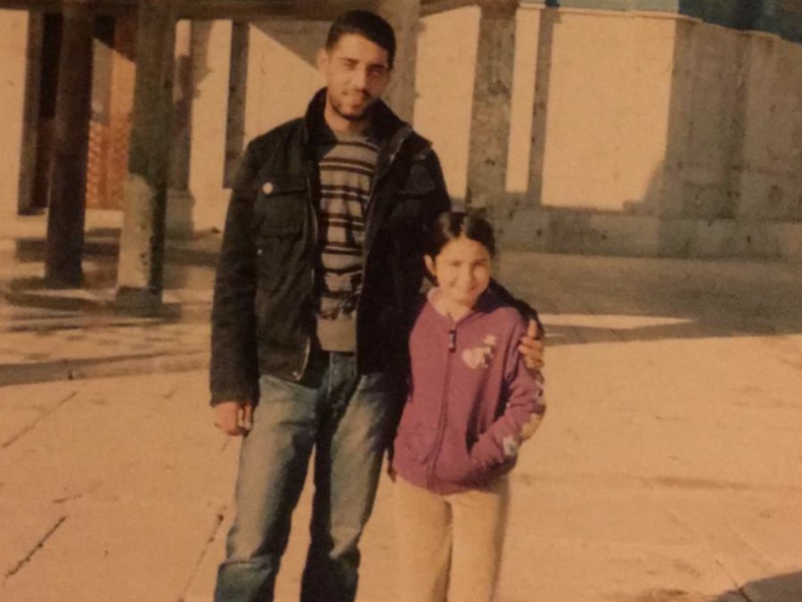 Tessa Johansen and her father, Tarek Abu Bassam Abu Sbeih, pose in Jerusalem on one of her visits.