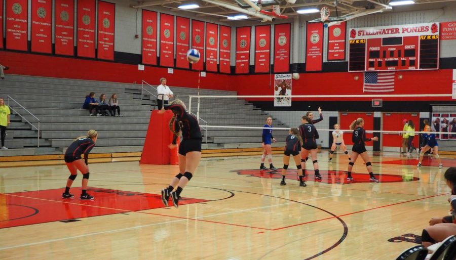 Senior Kate Raddatz serves the ball to Spring Lake Park in the first set. Stillwater went on to win 3-0 to move on to play Centennial Oct. 29 at 7 p.m.