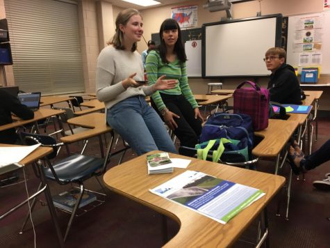 Student leaders Bijou Acers and Emma Bourne, both sophomores, lead a YFSS meeting during the morning of Oct. 9. They discuss the use of solar power in the school district. 