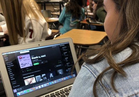 Junior Allie Smith listens to Grande's new song. It has been at the number one spot of the Top 100 Billboard Charts for two consecutive weeks.