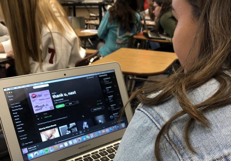 Junior Allie Smith listens to Grandes new song. It has been at the number one spot of the Top 100 Billboard Charts for two consecutive weeks.
