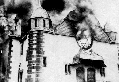 A German synagogue left to burn, no firefighters will come. Nov. 1938, similar attacks are being carried out across Germany on the night known as Kristallnacht. Last October the shooting of a synagogue in Pittsburgh shows that antisemitism is still present despite the defeat of Nazi Germany. 