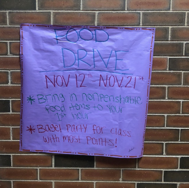 Poster made by a National Honor Society student to advertise the food drive. It gives information needed for students to participate in the food drive.