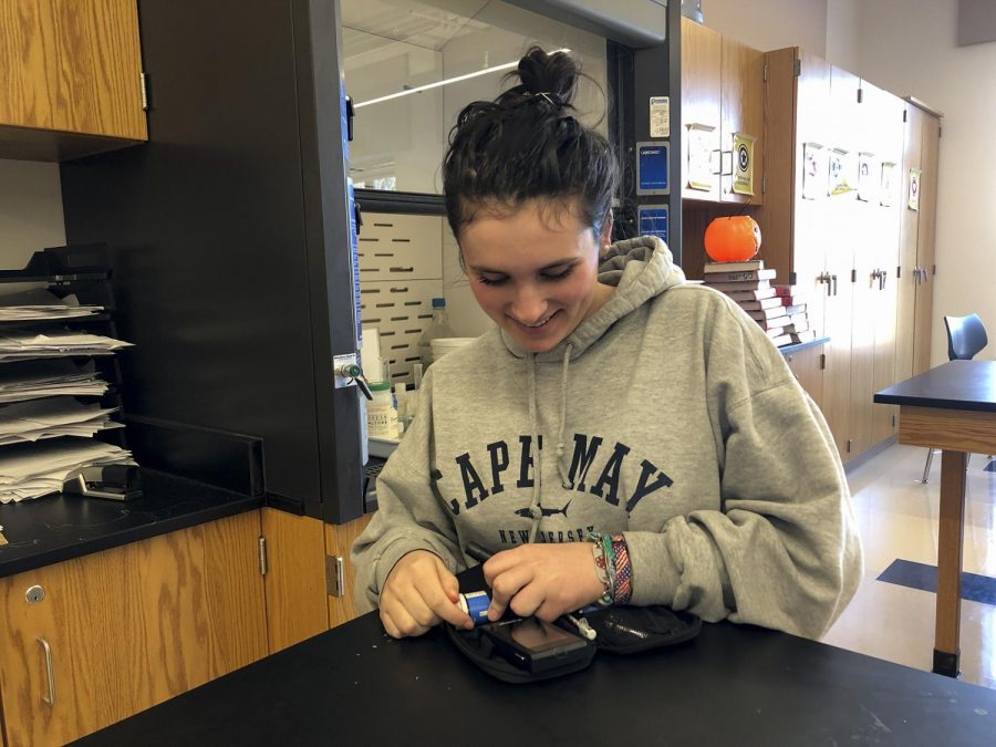 Sophomore Sophia Nelson tests her blood sugar level, by using a blood glucose meter, testing strip and lancing device. Sophia checks her blood sugar levels multiple times a day to ensure that it is not too high or low.
