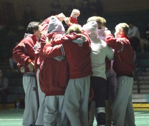 The wrestling team gets excited before wrestling in a meet. They wrestled and won, against their biggest rival, Mounds View, on Dec. 20 at Mounds View High School.