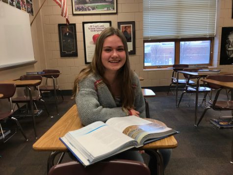 Senior Laura Kern studies in her favorite class, history. Kern enjoys history and helps her learn more about the American culture.