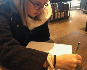 Junior Alli Kelm prepares for the ACT. There are multiple ways to prepare for the ACT. Kelm practices  her speed and knowledge of questions by doing practice worksheets.