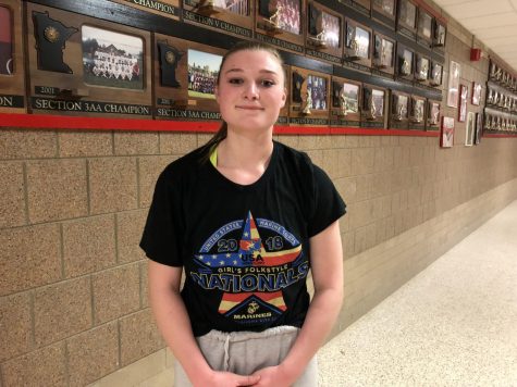 Madi Horn relaxes after a hard wrestling practice. She continues to perform to her best during every practice and every match.