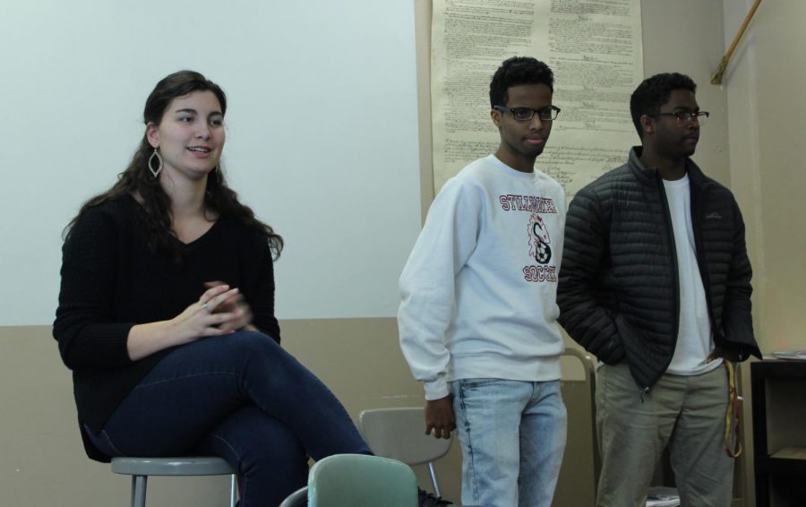 Student Council Presidents Nikhil Kumaran and Abdul Mohamed visit social studies and music classrooms to encourage fellow students to attend a school board meeting. Senior Isabella Portelli presents beside them. 