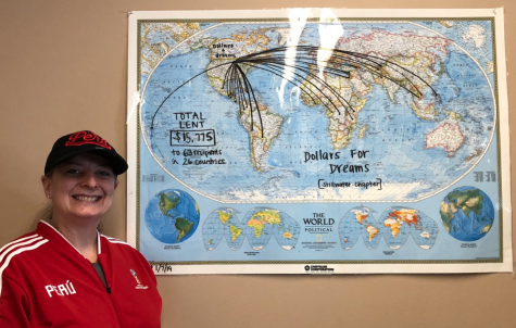 Dollars for Dreams displays a map in Spanish teacher Kirsten Carter's room to show where their loans go. Members started this map when the club first began three years ago. They have helped 63 different people in 26 countries.