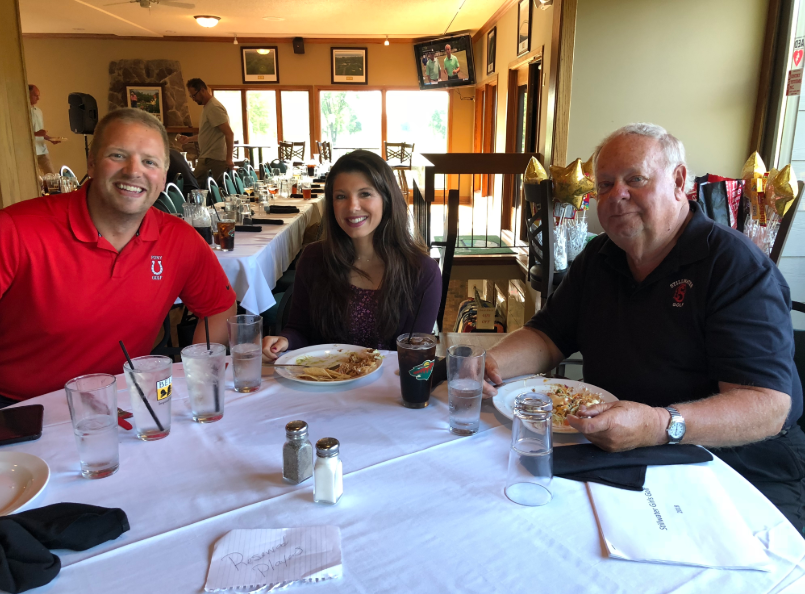 Don Gettinger,  far right, sits with his fellow assistant golf coaches Chad Bischoff, left, and Jordyn Price, middle. Gettinger has coached in the Stillwater golf programs for 15 years. 