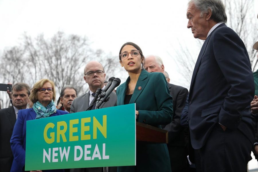 Rep.+Alexandria+Ocasio-Cortez%2C+D-N.Y.+%28center%29+and+Sen.+Ed+Markey%2C+D-Mass.+%28far+right%29+give+a+press+release+on+their+new+resolution%2C+the+Green+New+Deal.+The+proposal%27s+name+is+modeled+after+former+president+Franklin+Delano+Roosevelt%27s+%22New+Deal%22+that+brought+the+United+States+out+of+the+Great+Depression.