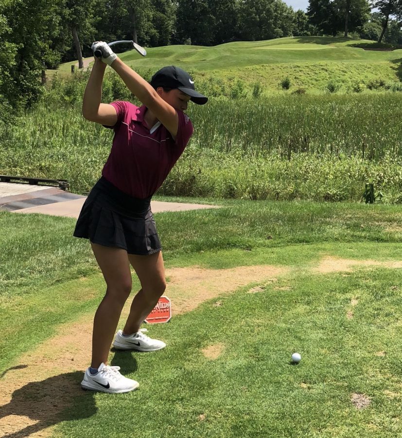Sophomore Savannah Vincent, takes a shot during the spring last year. Preparing for State last season, Vincent practices at Oak Glen Golf Course.