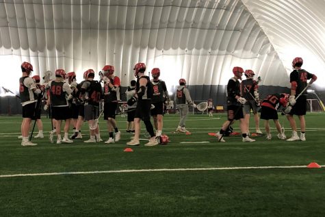 The boys lacrosse team practices at the St. Croix Valley Recreation Center. The team has now switched to distance coaching during the pandemic.