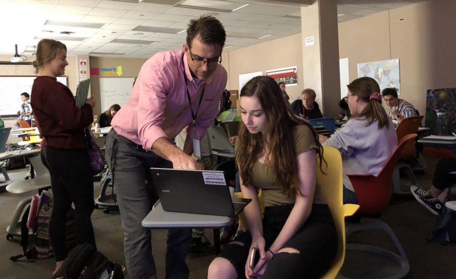 History teacher Matt Kiedrowski gives junior Serena Hiveley advice on summer internships. He recommended doing one in high school for more experience in a certain job field.