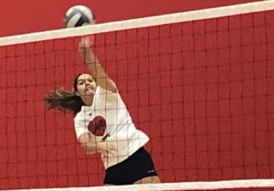 Junior Sydney Dejarnett goes for a kill during practice last Tuesday, Sept. 12. The team looks to improve their number of wins against Forest Lake on Tuesday.