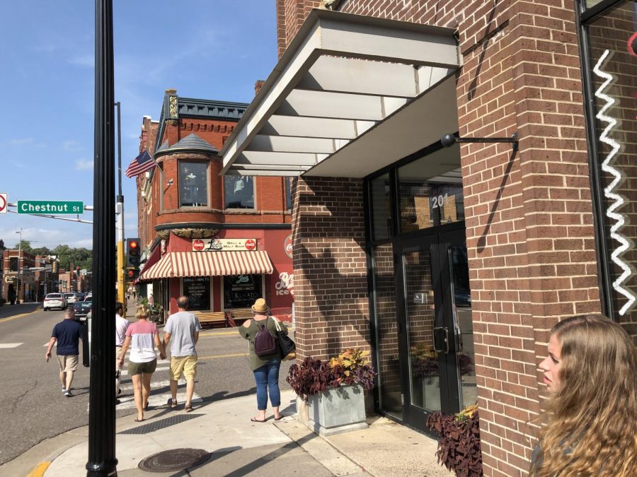 Locals and tourists browse through downtown, passing the former Mara-Mi retail storefront location. The space is currently vacant. Many  excitedly wait to see what takes its place. 
