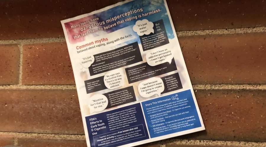 A nicotine flyer hangs near popular bathrooms, visible to students walking by. The flyer portrays the threatening risks of vaping as a teenager. 