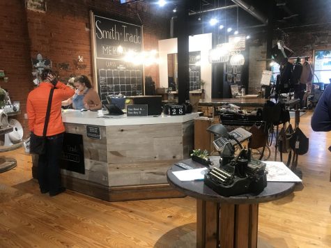 Senior Sydney McNurlin answers customer questions about certain products at Smith + Trade Mercantile. Friendly
and smiling customer service make the atmosphere of the store more enjoyable. Customers feel welcome, despite employees getting ready to close.