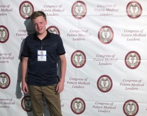 While most students were sitting by the poolside, junior Keegan Kogl was in Boston for the Congress of Future Medical Leaders.  The event took place last June, and he got his certificate of excellence for attending it on Sept. 27.