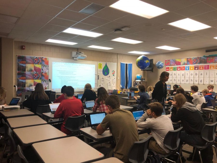 Sara Damon helps her AP human geography students on a class assignment. Her experiences from the Fulbright scholarship helps her students who are struggling to complete their work.