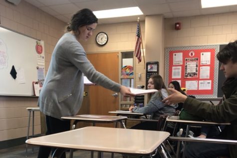 Students review their Precalculus unit test by going over frequently missed questions with math teacher Sara Biermaier during class time. MCA tests should be treated in the same respect, where teachers encourage studying by reviewing material with students. 