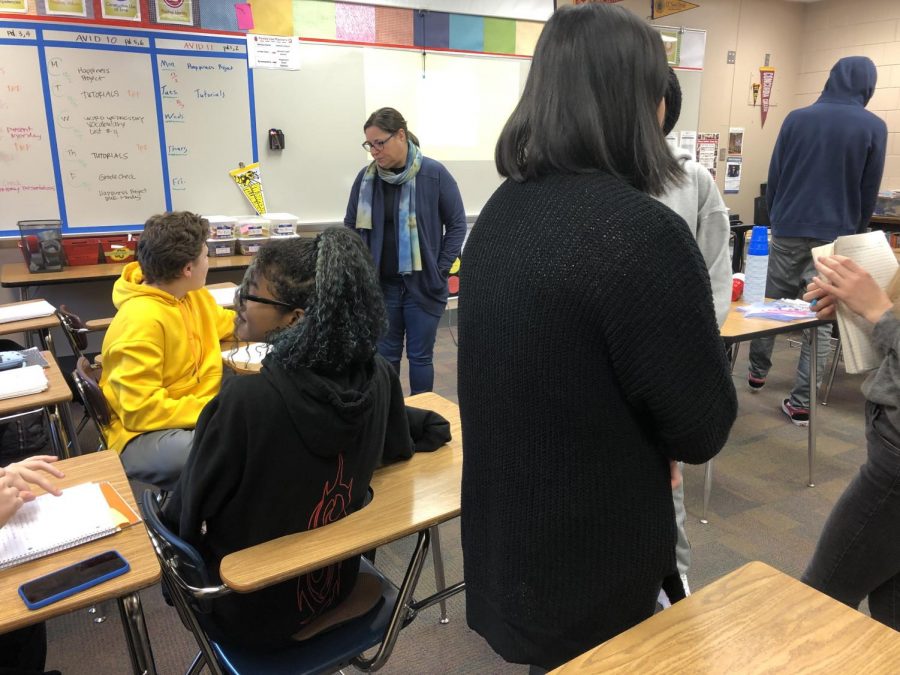 Juniors in hour 1 students learn through their participation in the attainment of knowledge by gathering information and processing it by solving problems and articulating what they have discovered.