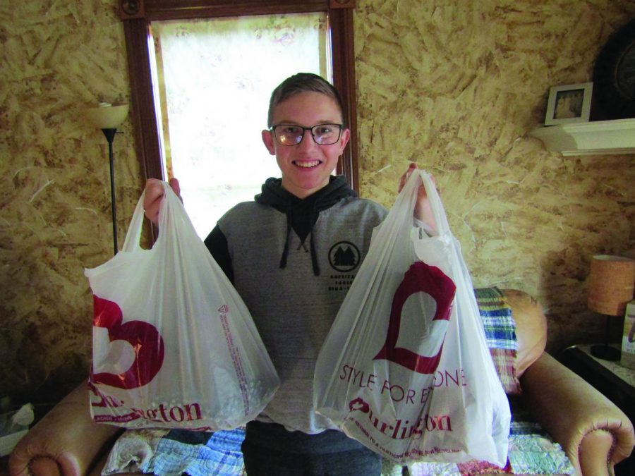 Sophomore Danny Valerius shows everything he got on his shopping spree at Burlington Coat Factory. He was able to spend on a lot of cool products.
