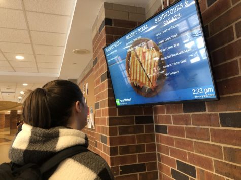 The daily lunch menu displayed in the school cafeteria exhibits meal options for the day. Students participate in diets, especially the keto diet, and struggle to find foods within their dietary restrictions. 