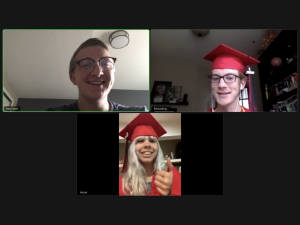 Newspaper editors-in-chief John Franklin and Hazel Flock gather on a final Zoom call. They dressed up in their cap and gown to signify the virtual graduation.