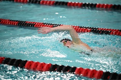 Senior Schuyler DuPont swims at sections on Oct. 24 at Stillwater Junior High. She recently verbally committed to Cornell for swimming.