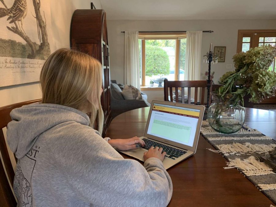 Senior Ava Nyberg works on her college application. Nyberg is working ahead on the parts of the application that she can complete before her ACT is submitted.