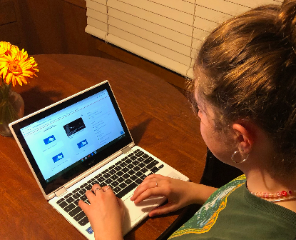 Junior Madeline Stricker learns from home. Although she is enrolled in the B-day hybrid option, she learns from home three days a week on platforms like Schoology and Zoom.