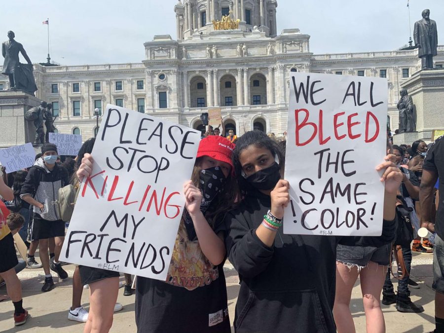 Juniors Addie Demars and Marly Boules attend a protest in St. Paul. Demars and Boules are both protesting to make a change in racial injustice and police brutality. Taylor's death impacts many like Demars and Boules to protest and push for equality in race.