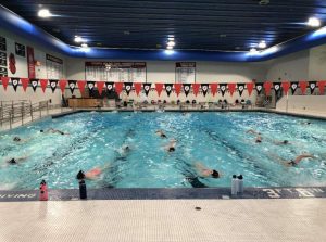 The girls swim and dive team practices during their 2020 season right before their sectional meets. This is similar to how the boys swim and dive team will look once their season is underway on Nov 30.