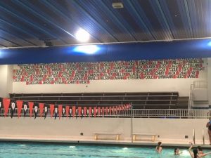 A wall display showing the names of the girls swim and dive team. They completed their fall season in late October. This season was different than others due to COVID-19. 