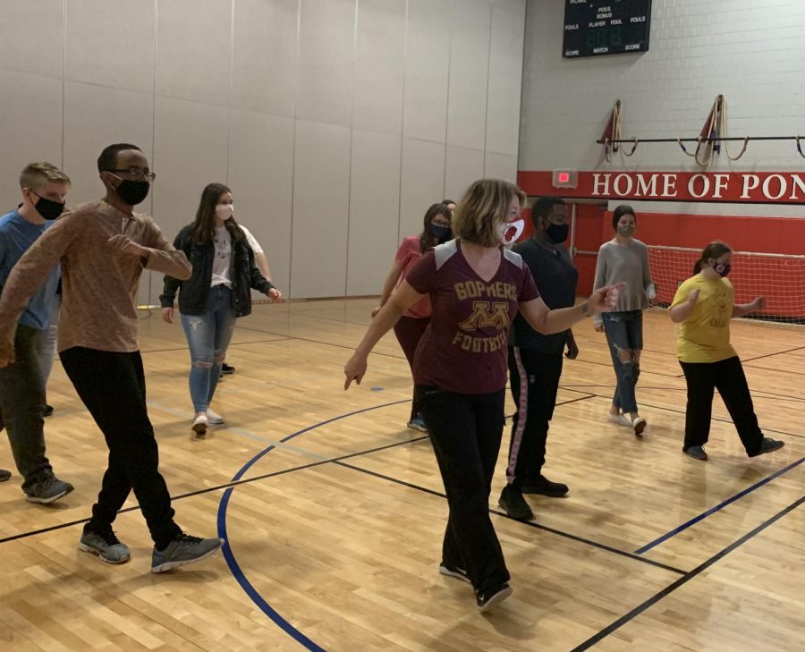 Paula Harrison and the Unified class follow along to a dance video. Dancing is one of the many activities students enjoy together in this class.
