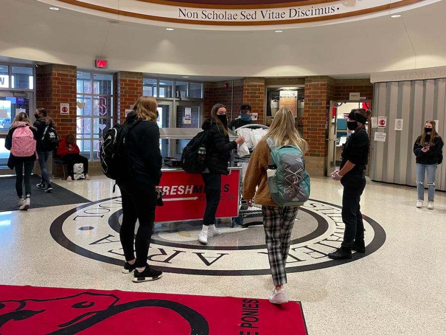 Students can grab lunch from three locations this school year, the main rotunda, the Pony Market, and the main lunch line. At least one cafeteria worker looks over each location to help students and count meals.