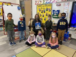 Gina Doe, the new Interim Principal at Brookview Elementary reads to the Pre-schoolers, as she gets to know the students.
