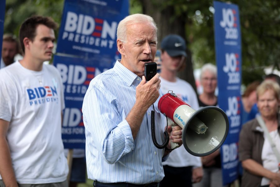 Former Vice President Joe Biden speaks with supporters at a pre-Wing Ding rally at Molly McGowan park in Clear Lake, Iowa. 