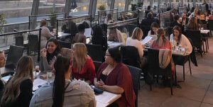 Union Rooftop Bar and Grill in downtown Minneapolis on March 26. Because of the COVID-19 pandemic, there are plexiglass barriers between tables, non-reusable paper menus, and masks are to be worn by all staff and customers when not actively eating or drinking.