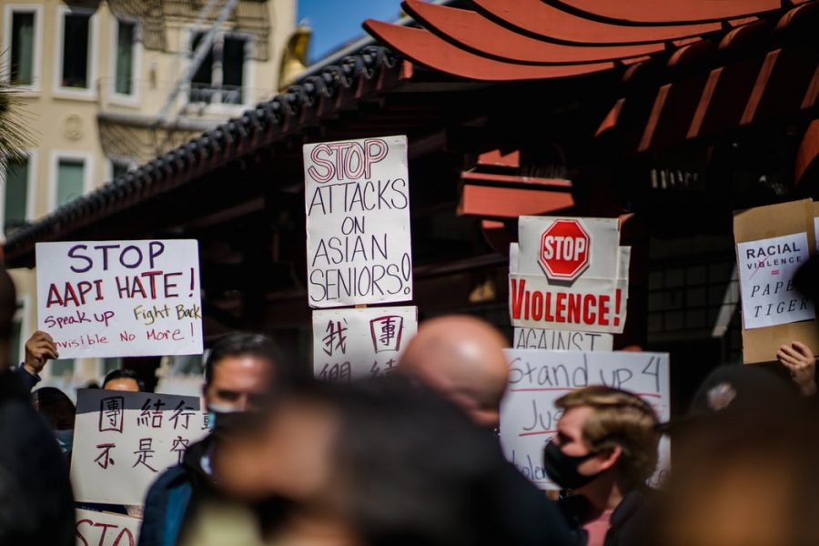 Demonstrators hold up signs at a protest in San Francisco. Rallies advocating for Asian lives have appeared in many major cities across the country, as anti-Asian hate crimes are increasing. 